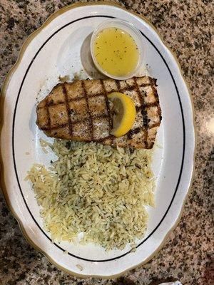 Chargrilled chicken and rice with a lemon butter sauce.