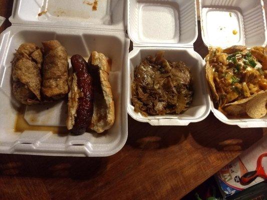 Egg rolls, beef brat, chicken nachos