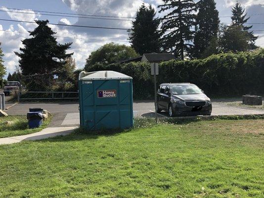 Ports-Potty and total of 3 parking spots