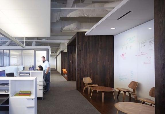 Nice use of seating and marker boards for hallways