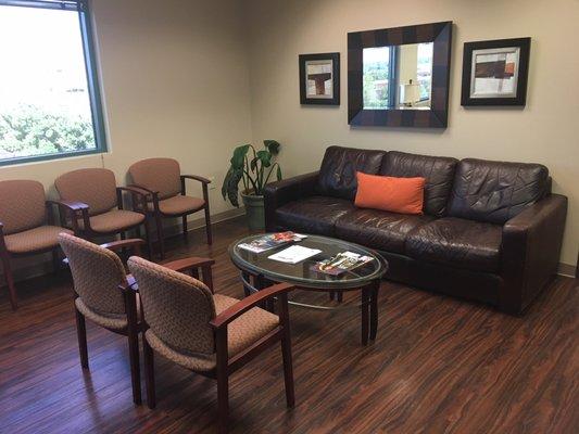 Comfortable seating in the waiting area with big windows that give it an open feel.Thanks to my wife for doing the interior decoration.