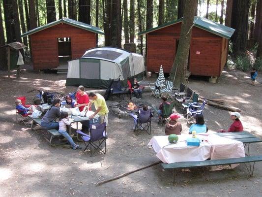 Shared campfire and picnic tables