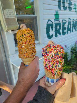 A regular sized chocolate cone with crunch coat (left)  A regular sized chocolate waffle cone with sprinkles (right)