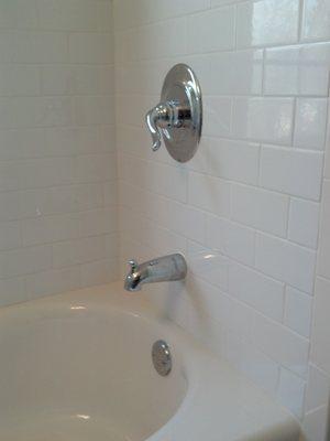 new tub and shower valve to update the look of the tile.