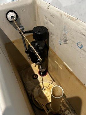 Rebuilt toilet changing filled valve and flapper