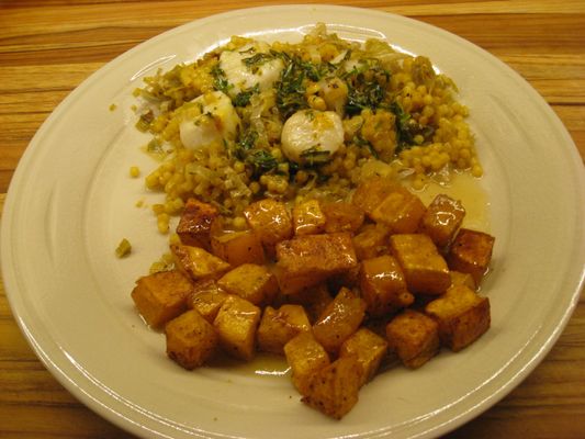 One-Pan Baked Scallops with Couscous, Braised Leeks, and Tarragon-Orange Vinaigrette