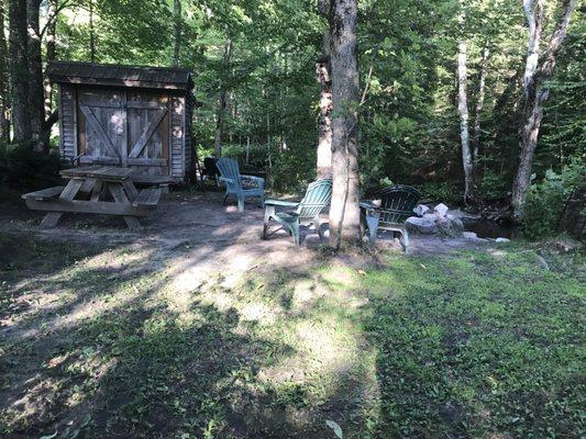 The river and fire pit area