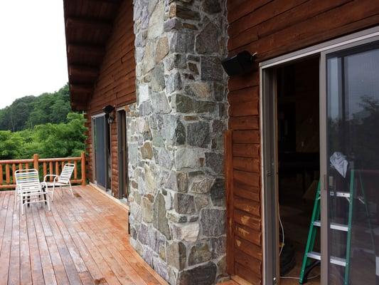 Outdoor Speaker Installation on a Log Cabin