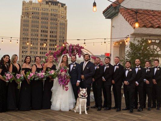 The arch, the bridesmaid/groomsmen flowers...perfection!