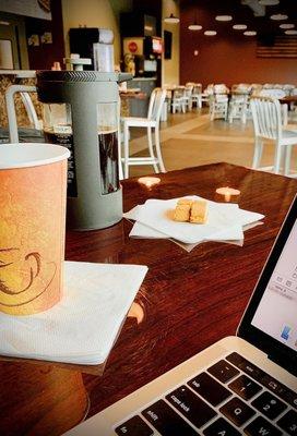 Bar height table, WiFi, French press coffee and biscotti