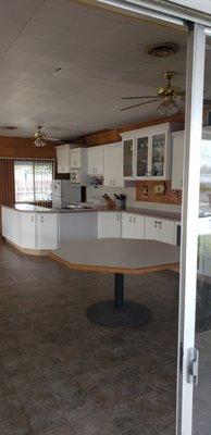 Community clubhouse room right half/ kitchen area