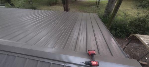 New metal roofing installation