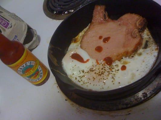 Smoked pork Chops (4 pack for about $8) and 2 eggs + dave's insanity sauce will keep you going till dinner