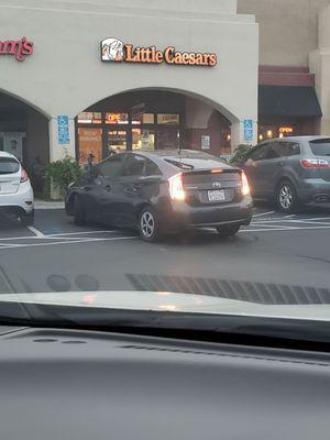 Pos delivery driver parked in handicap spot for 10+ min.