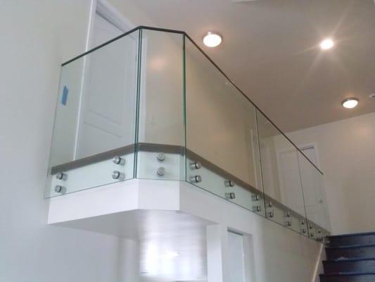 Custom glass work. Frameless shower enclosures, vinyl windows, wood windows, glass rails, storefronts, c-17 license and insured.