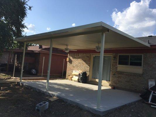 Finished concrete & cover installed w/ ceiling fans