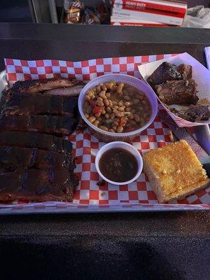 Ribs, brisket, beans and corn bread.