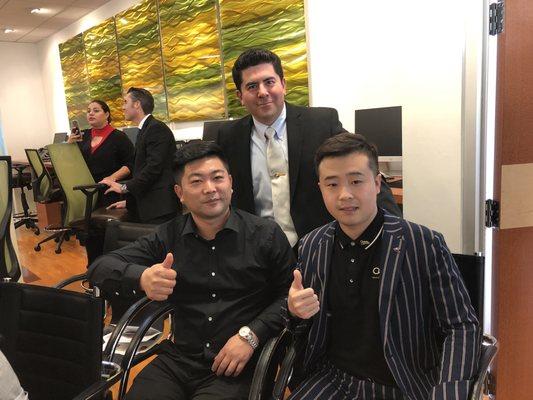 Oscar Trejo with Dongyi Li, General Manager & Jin Liu, Broker Zhongyuan District