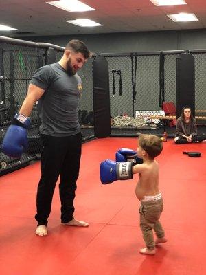 Daddy teaching him early