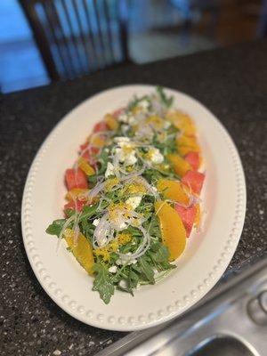 Watermelon,feta and arugula salad with citrus vinaigrette.