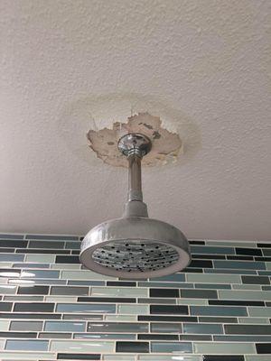 Giant leak and drywall falling off the ceiling around the new shower head developed six months after completion