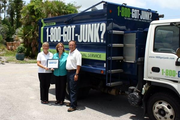 1-800-GOT-JUNK? Pinellas receiving Green Business Award.