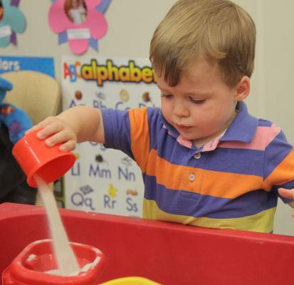 Sand and water tables encourage discovery