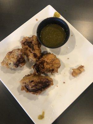 Piggy back appetizer with mojo sauce ( cilantro)