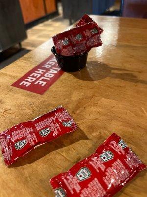 Sticky ketchup pack and their ruined ketchup.