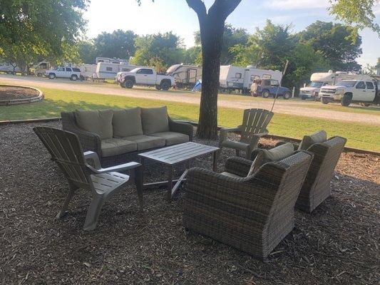 Cozy seating area under a beautiful tree