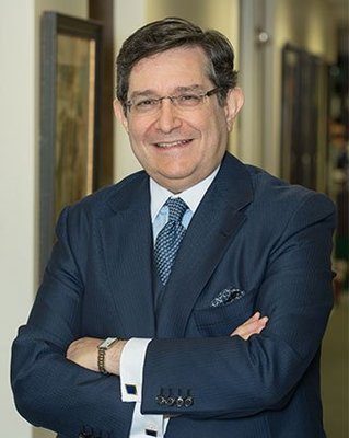 Headshot picture of Mark E. Seitelman inside his office