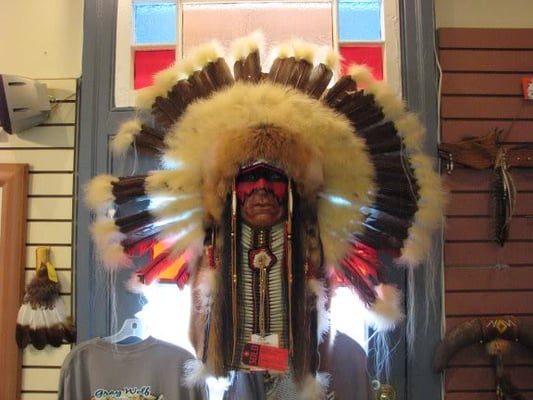 Handcrafted, wooden American Indian face with headdress, from Washington State.