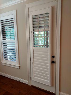 3.5" Composite Shutter w/ hidden tilt mounted on a door.