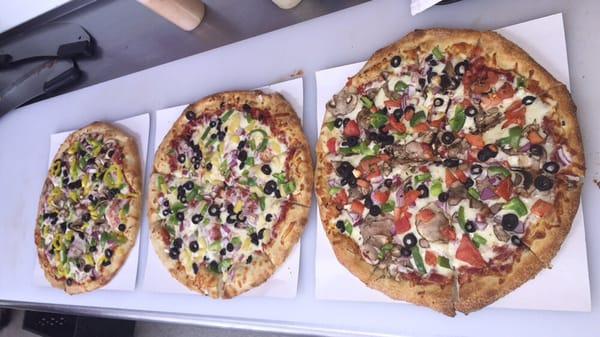 Three yummy varieties of veggies pizzas!