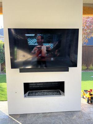 TV on the patio with sound bar, in ceiling surround speakers, in ceiling subwoofer, equipment upstairs in a closet.