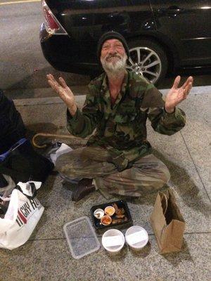 An Overjoyed Homeless San Diego veteran thanking God for 'Lids of Encouragement's Unique and Encouraging Meals