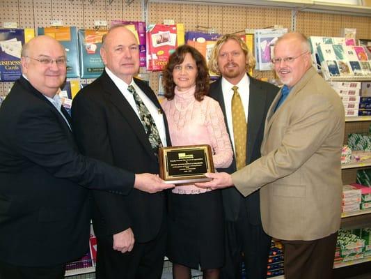 Chris & Linda getting an Award from United Stationers.