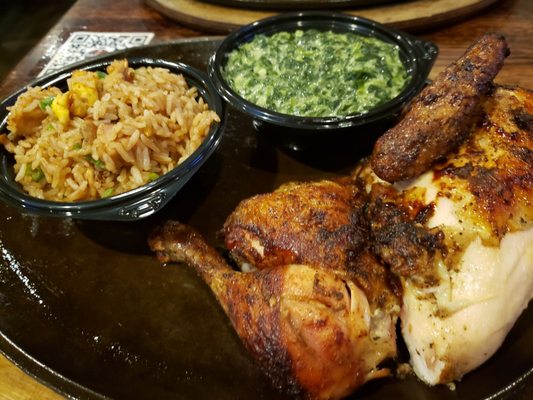 Half chicken with creamed spinach and chicken fried rice