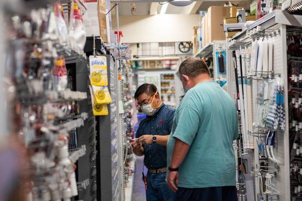 Mike, our store manager, helping a customer.