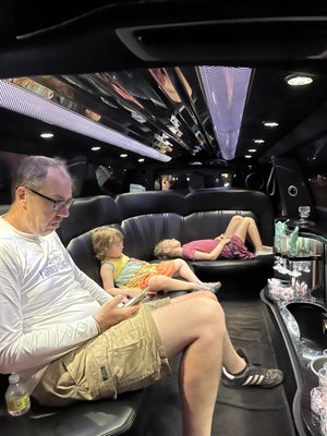 Fam living the high life on our ride home after a week of vacation.