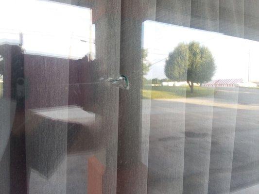 Broken window that staff claimed is  "not broke, because it has been that way for 3 years"