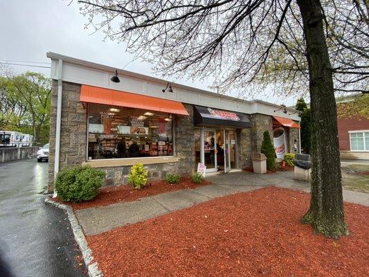 Decent Dunkin' Donuts store with their own parking lot in back