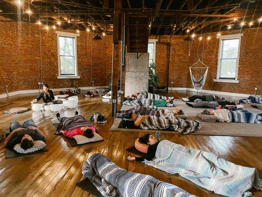 Attendees enjoying a sound bath at The Sound Healing Center of Lexington.