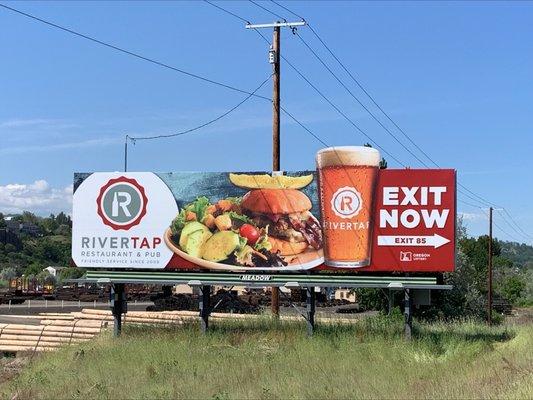 Billboard advertising River Tap Pub in The Dalles, Oregon