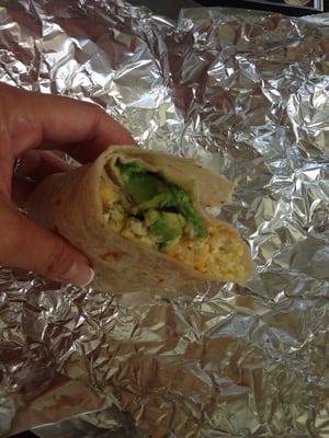 Breakfast burrito with egg, cheese, hash browns, & avocado for $5.80!