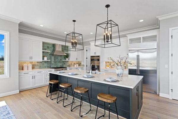 Bonney Lake home with a two-tone kitchen and undermount lighting