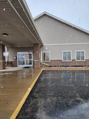 Snow falling outside The Woodlands Senior Activity Center