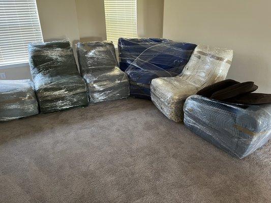 This is a photo after we took the apart sofa and wrapped it blanket, tape , shrink wrap for extra protection.