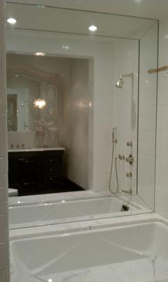 Elegant custom made bevel framed bath mirror. A true "Touch of Class"!