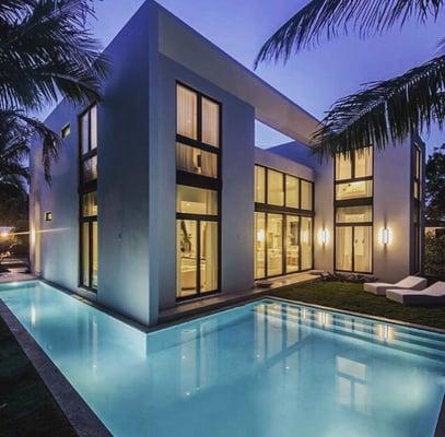 This gorgeous dream home is located in Miami, Florida. It has 4 bedrooms, 4.5 bathrooms and a swimming pool.